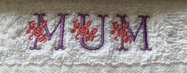 Floral themed: Embroidered Face cloth. - Image 9