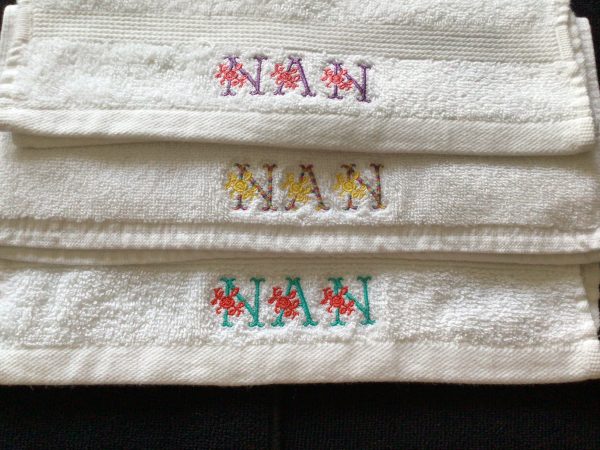 Floral themed: Embroidered Face cloth. - Image 5