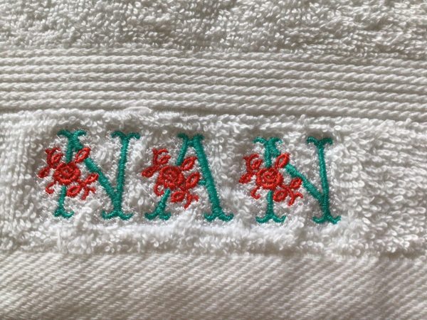 Floral themed: Embroidered Face cloth. - Image 3