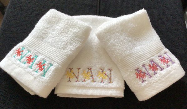 Floral themed: Embroidered Face cloth. - Image 2